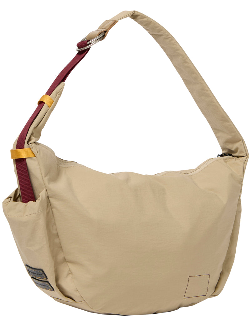 Universal Works X Master-Piece Canvas Shoulder Bag M Beige Back Angled View