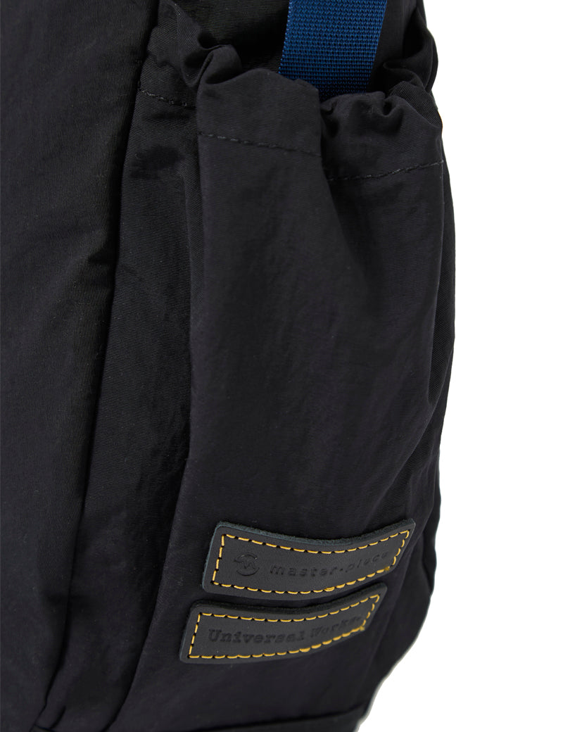Universal Works X Master-Piece Canvas Shoulder Bag M Black Branding Detail