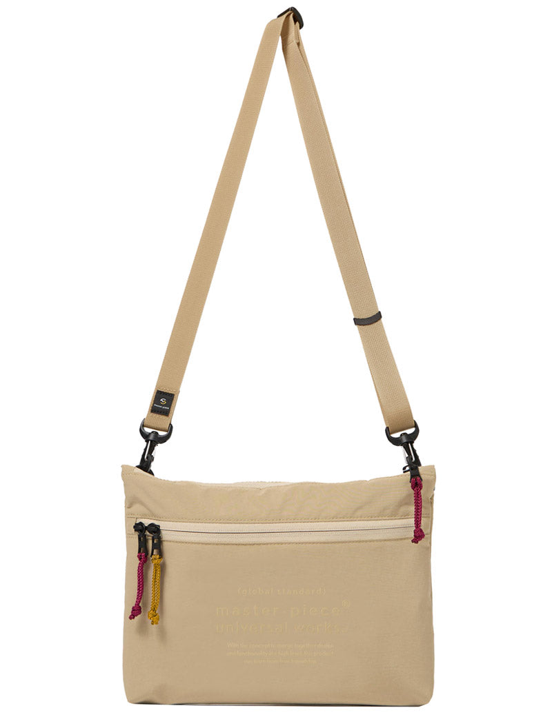 Universal Works X Master-Piece Canvas Sacoche Beige