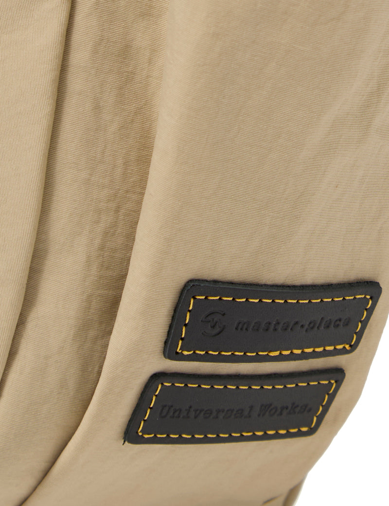 Universal Works X Master-Piece Canvas Shoulder Bag M Beige Branding Detail